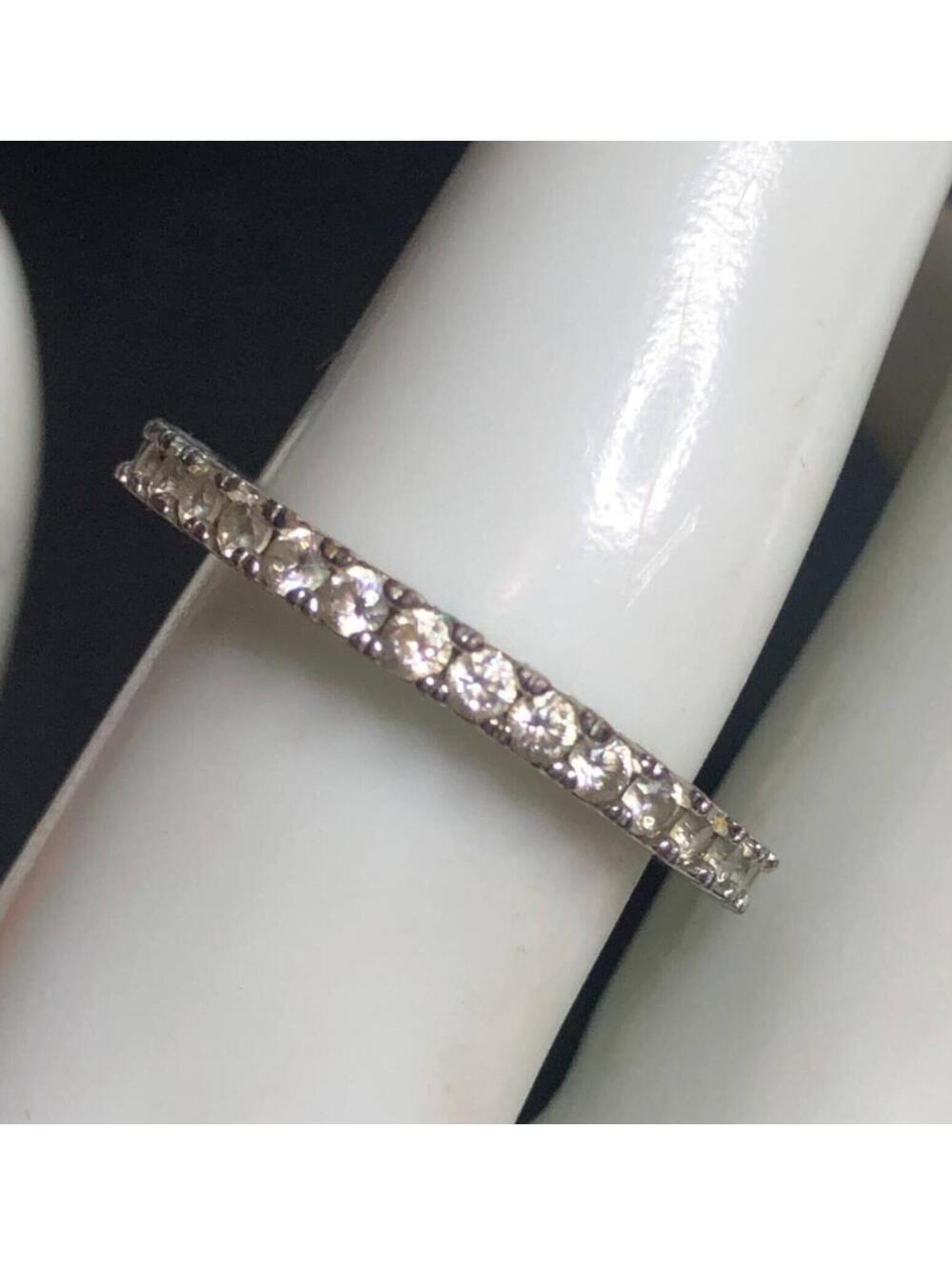 4976 Joan Boyce Tasteful eternity CZ band ring size 7